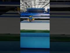 Che cos'e' una macchina per avvolgere e tagliare i tessuti non tessuti?